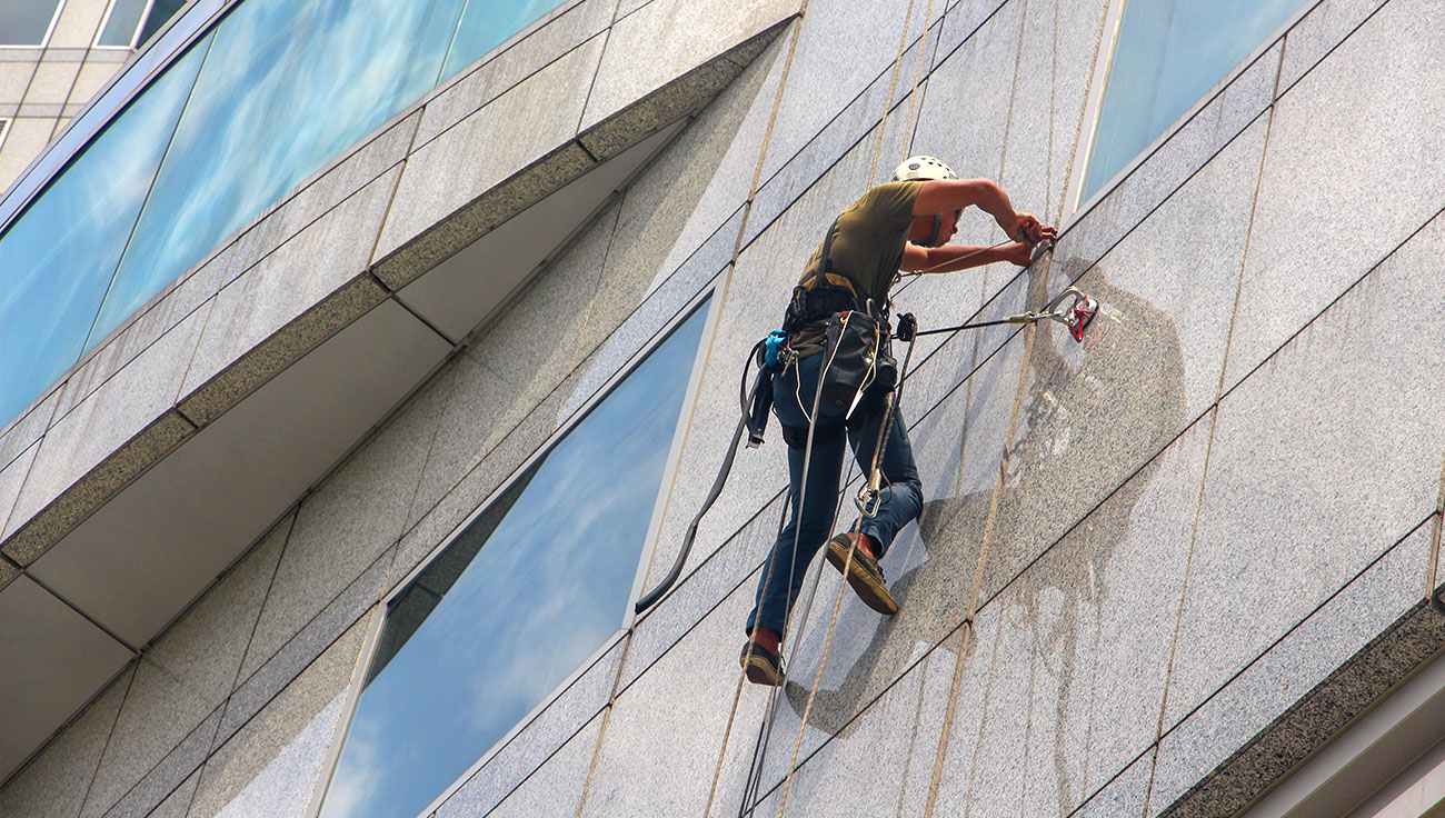 Man Cleaning Window