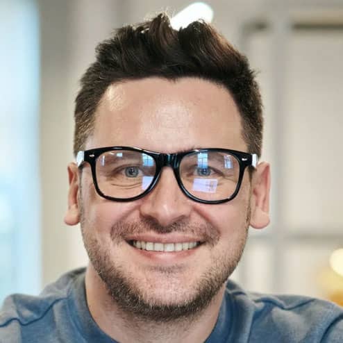 Man with Glasses Smiling